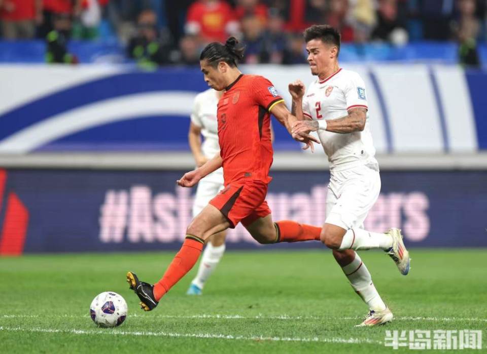 国际足球比赛中中国队取得关键胜利